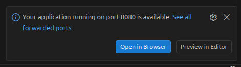 A notification saying that the application running on port 8080 is available, with an Open in Browser button